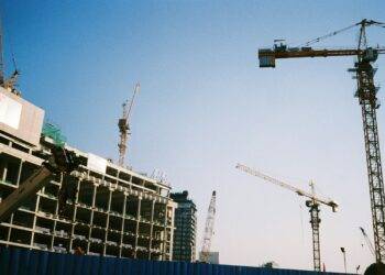 white and blue building under blue sky during daytime